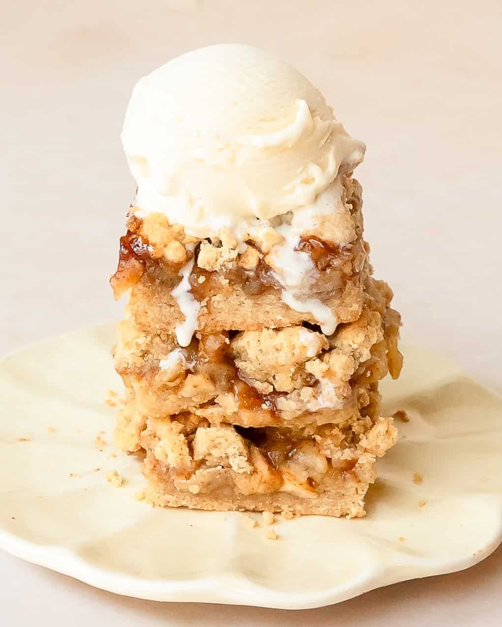 Apple pie bars with a buttery crust, cinnamon apple filling, and golden crumb topping.