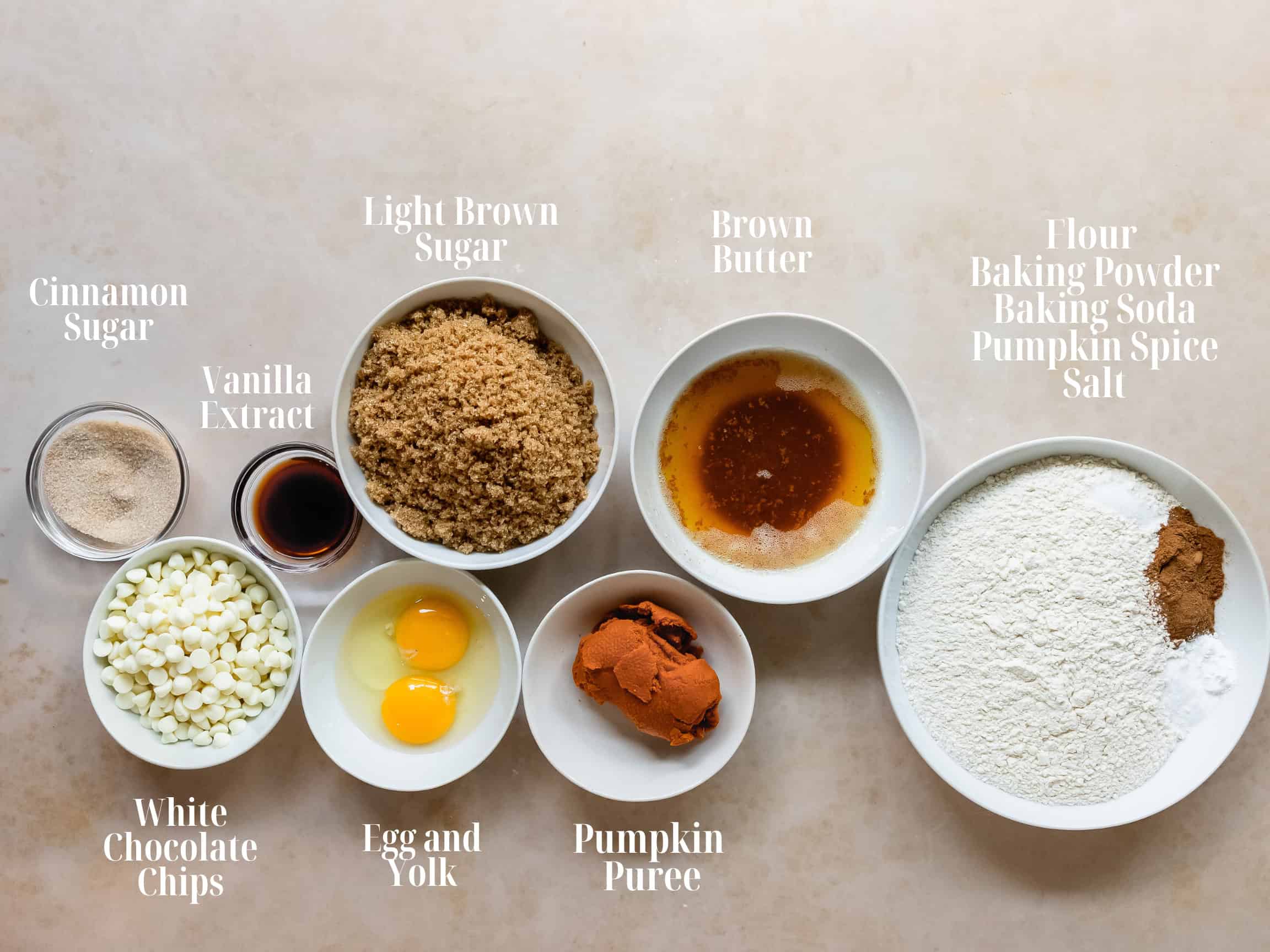 Ingredients to make pumpkin blondies in bowls.