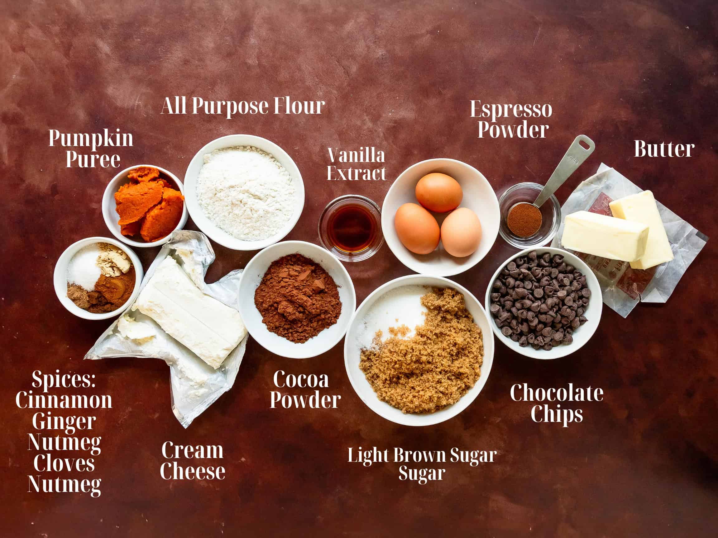 Ingredients to make pumpkin brownies in bowls.