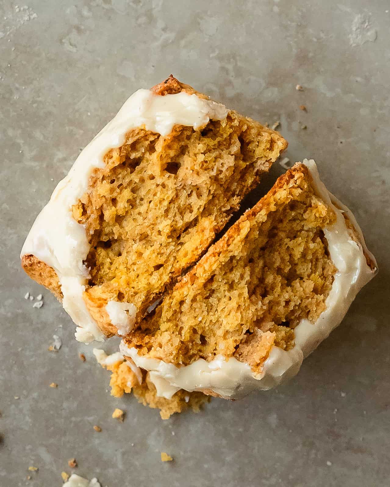 Close-up of a golden pumpkin scone showing its soft interior.