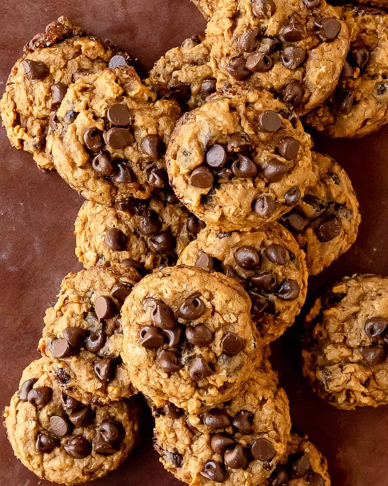 Freshly baked sweet potato cookies with golden edges and soft centers and melty chocolate chips.